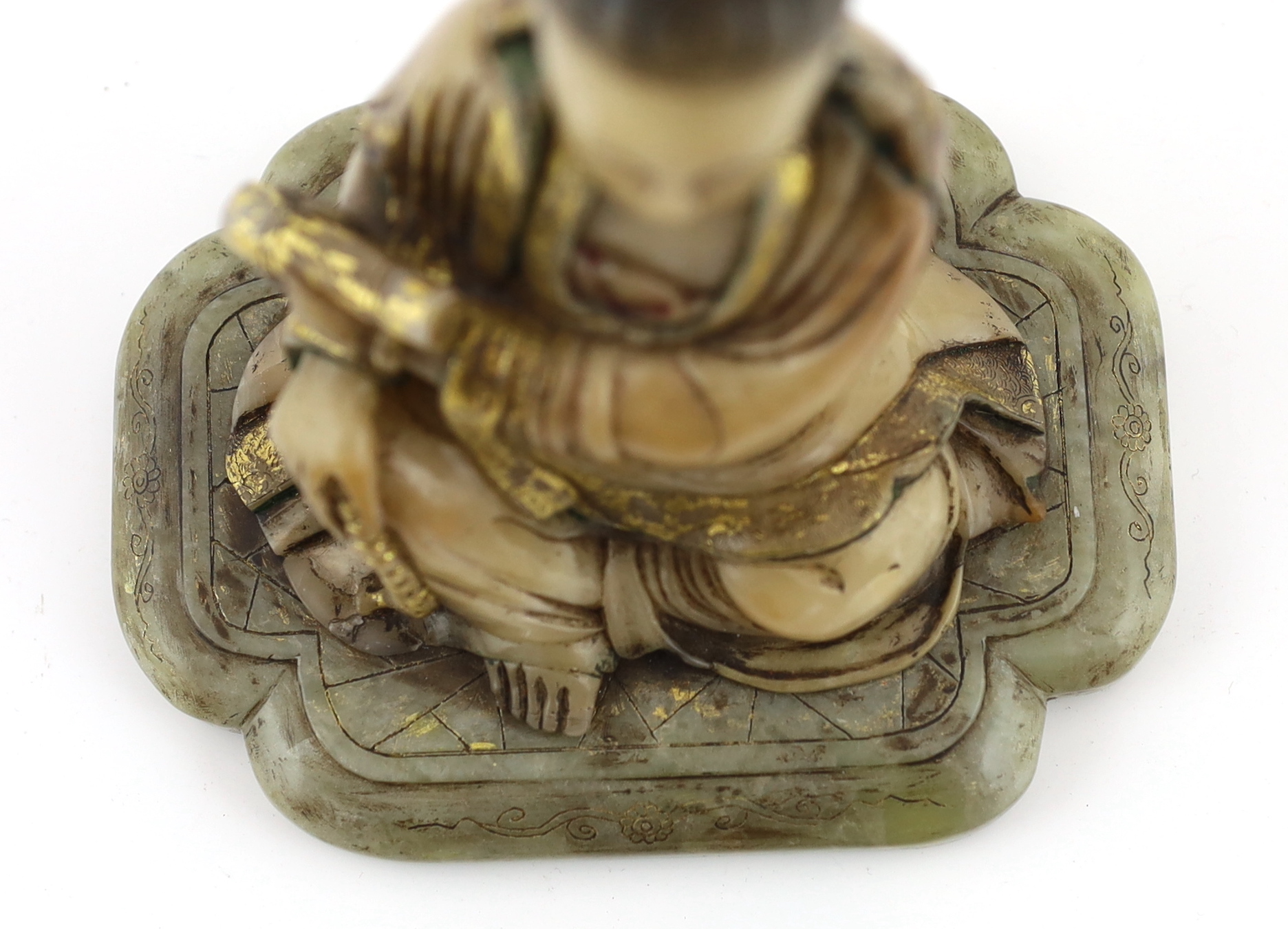 A Chinese soapstone seated figure of Guanyin, 17th/18th century